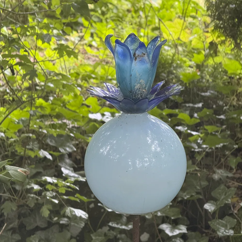 Fantasiblomst i glas