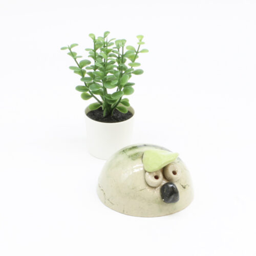 Det mistroiske kugledyr. Skulptur af Finn Møller (B*H: 9*5 cm)