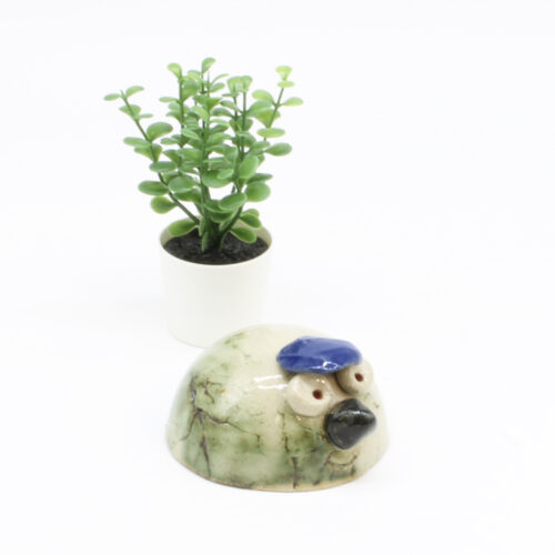 Det forbeholdende kugledyr. Skulptur af Finn Møller (B*H: 9*5 cm)