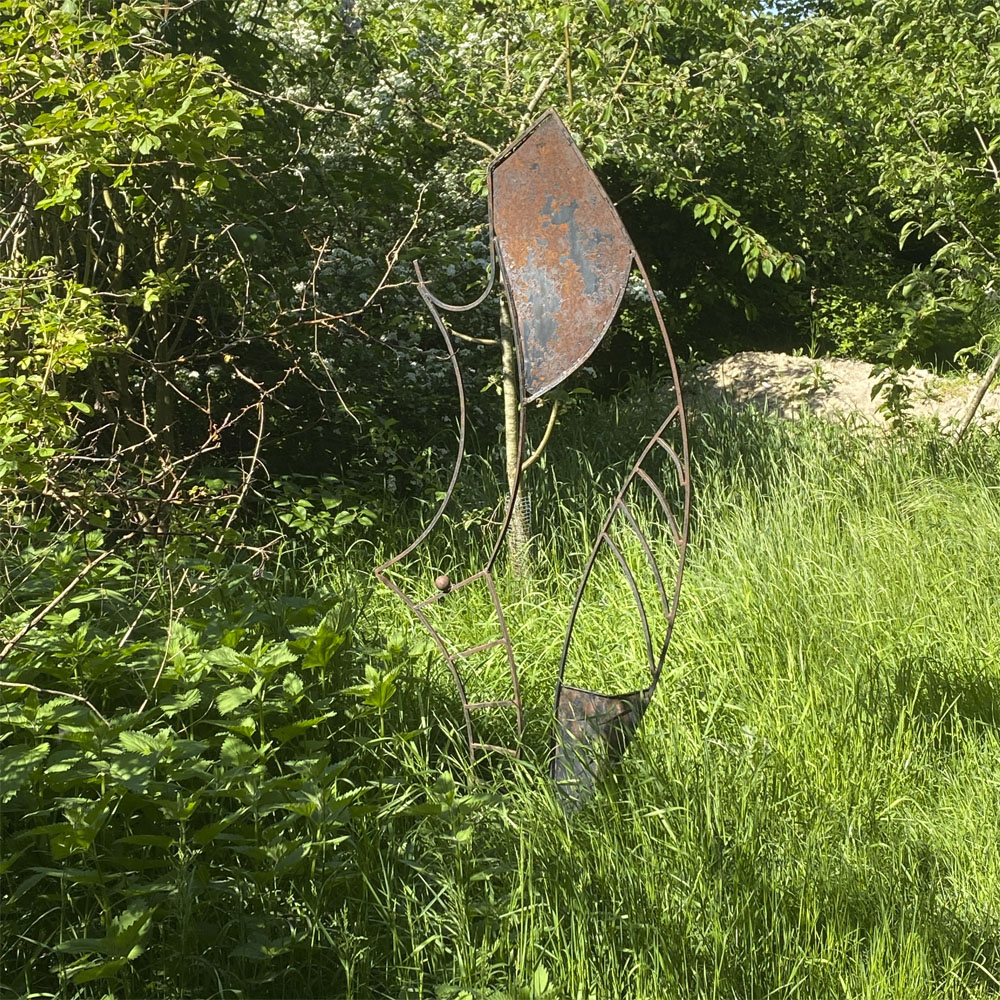 Beachsurfer. Værket er udført af en ukendt kunstner